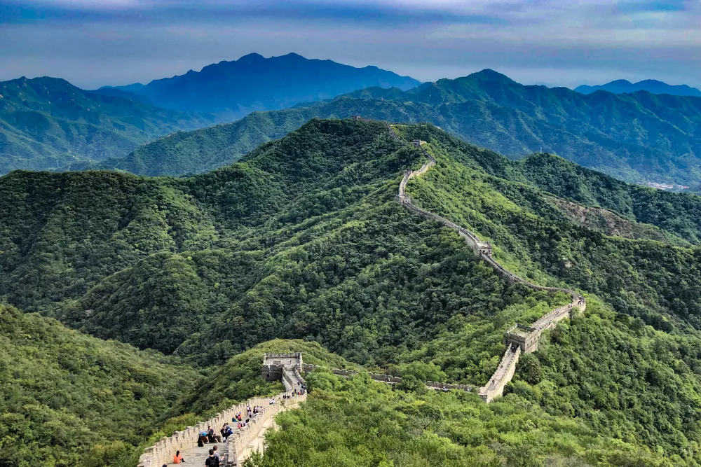The Great Wall following wooded mountain ridges at Mutianyu, viewed from Watchtower 20